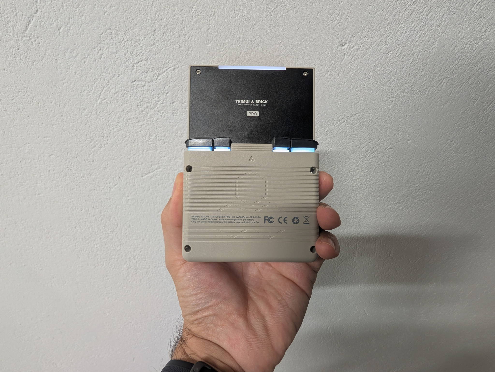 TrimUI Brick Pro front view showing the laminated 4:3 display