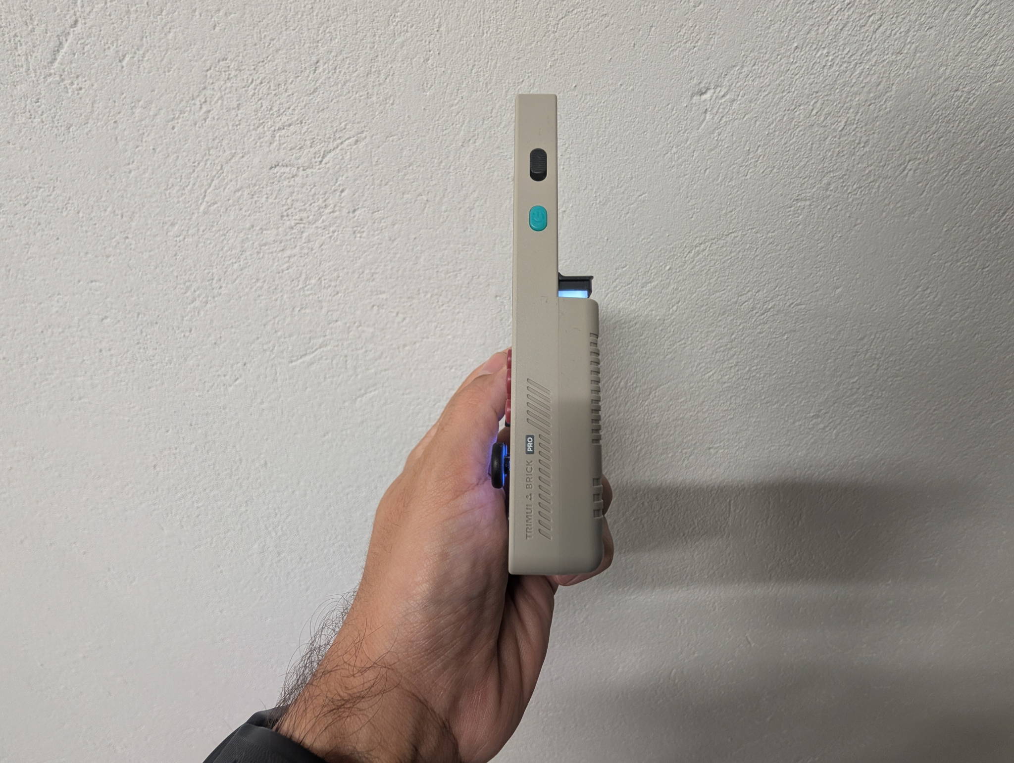 TrimUI Brick Pro top edge showing the dual USB-C ports and microSD slot