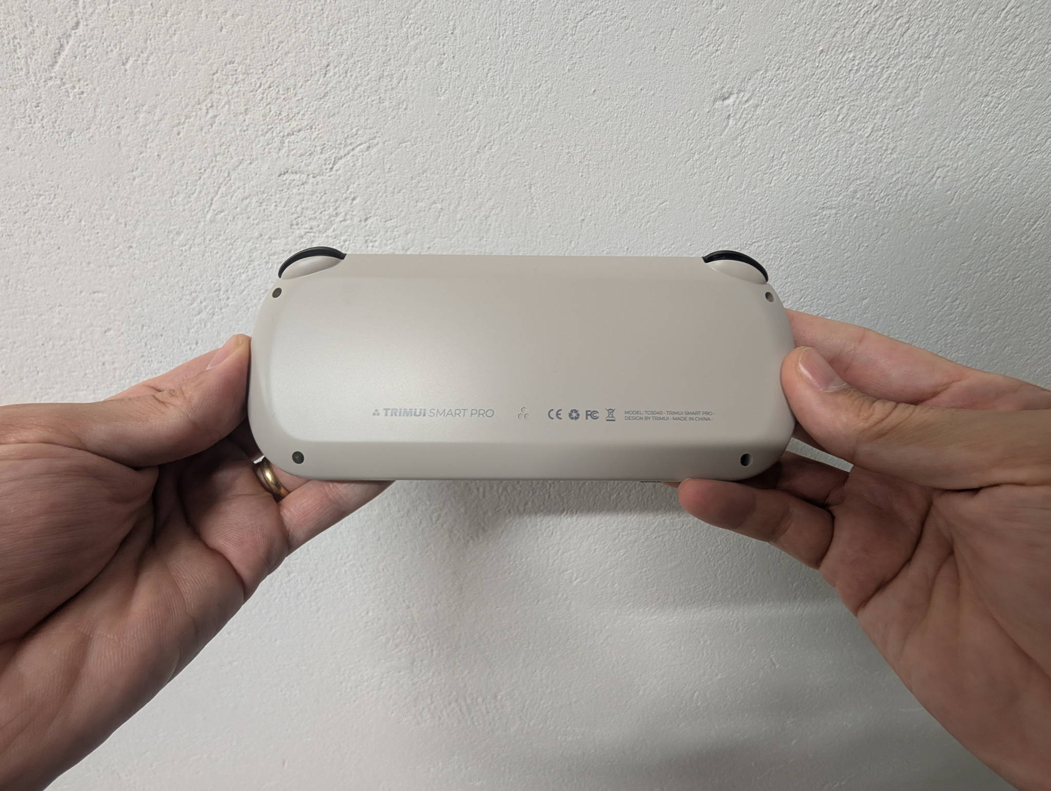 TrimUI Smart Pro in Vintage Gray, three-quarter view